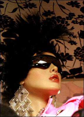 Fun retro 80s party theme. Picure of woman in pink with sunglasses.