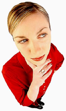 Woman in red blouse thinking about her New Years resolutions.