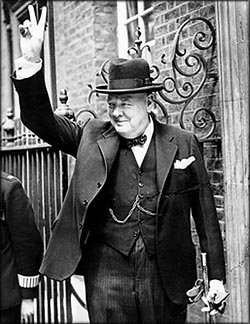 Churchill quotes: Photo of Winston Churchill doing his famous V sign.