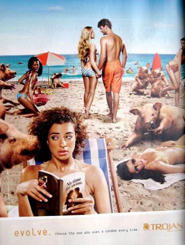 Trojan condom ads - woman surrounded with pigs on the beach