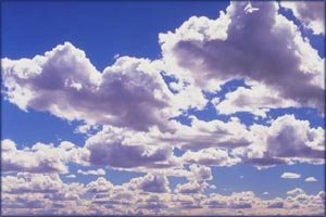 White clouds on a clear blue sky.