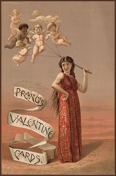 Old antique looking Valentines Day picture of woman in red toga holding several cupids on a string.